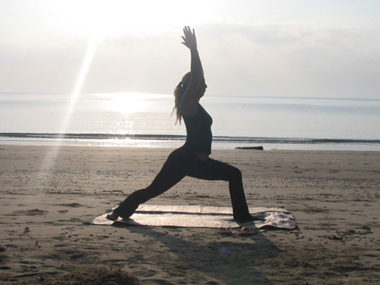 yoga pose on beach
